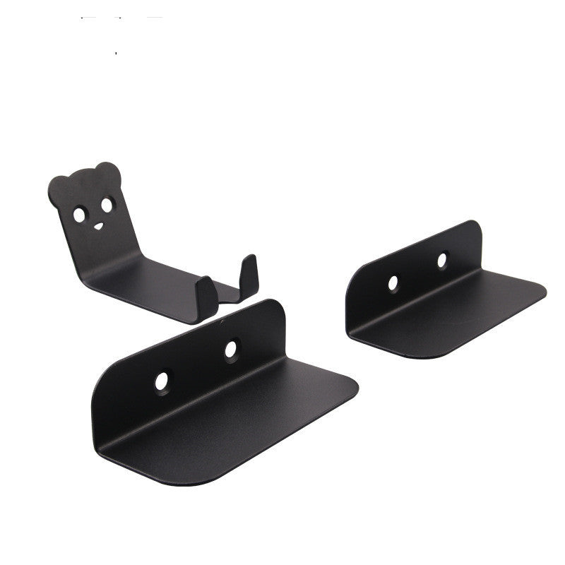 Set of black metal bicycle storage brackets on a white background