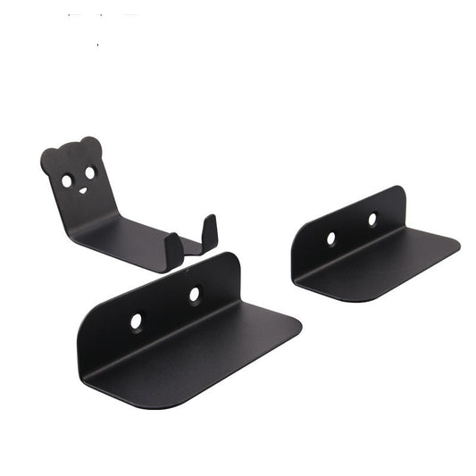 Set of black metal bicycle storage brackets on a white background