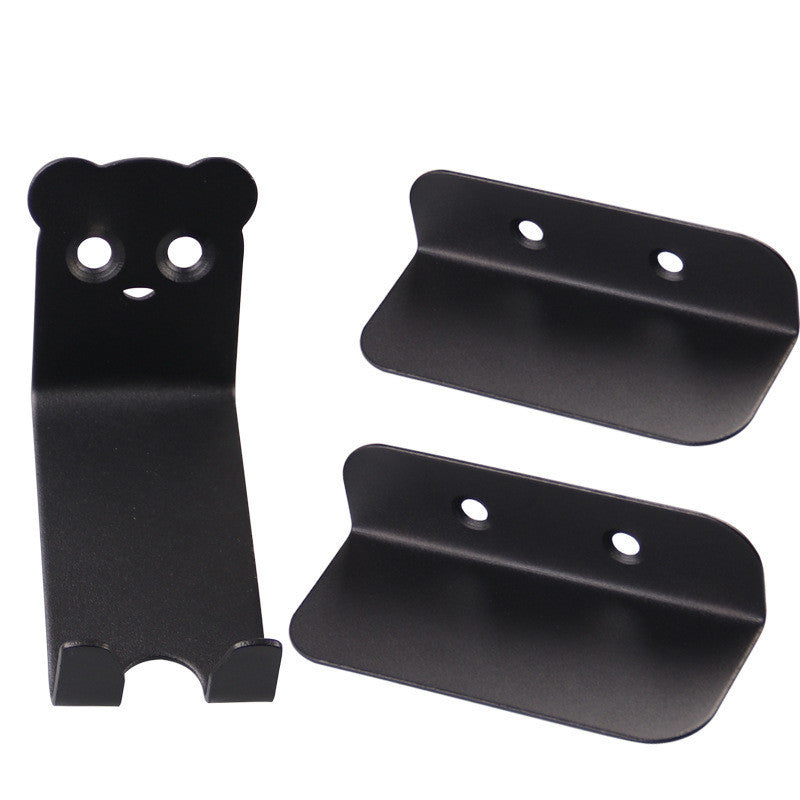 Set of black metal bicycle storage brackets on a white background