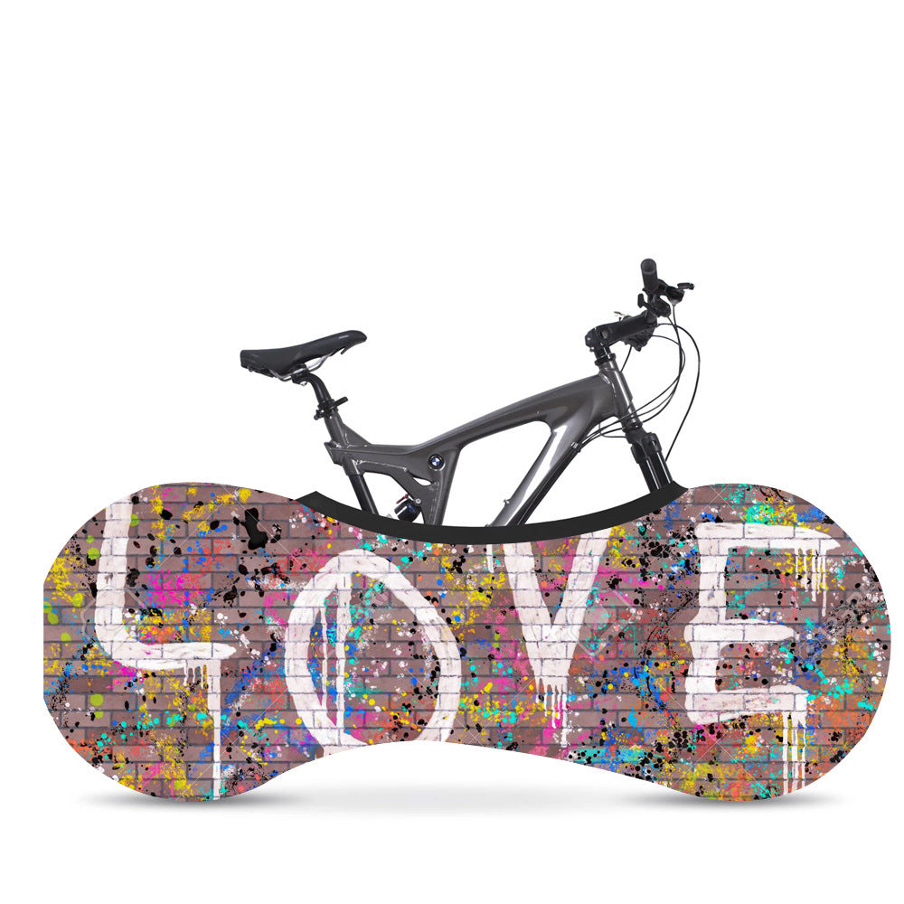 Bicycle with a colorful 'LOVE' motif dust cover on a white background