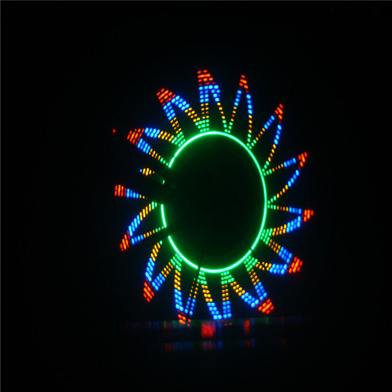 Colorful LED wheel spinning on a black background