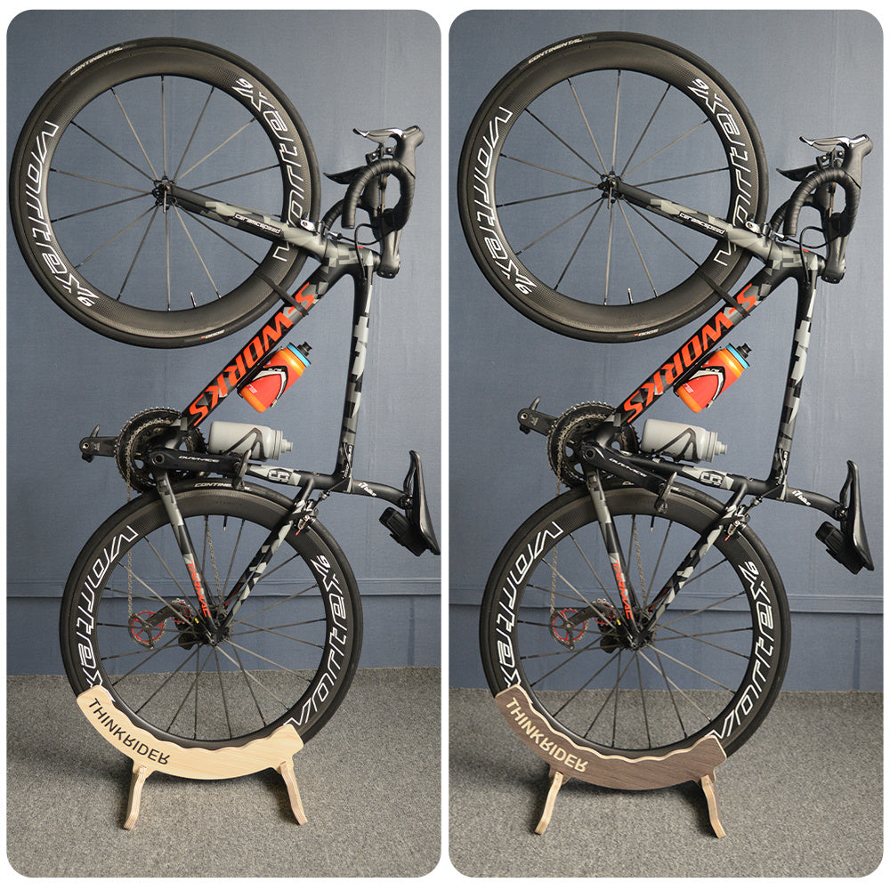 Bicycle on a stand with ThinkRider branding against a gray background
