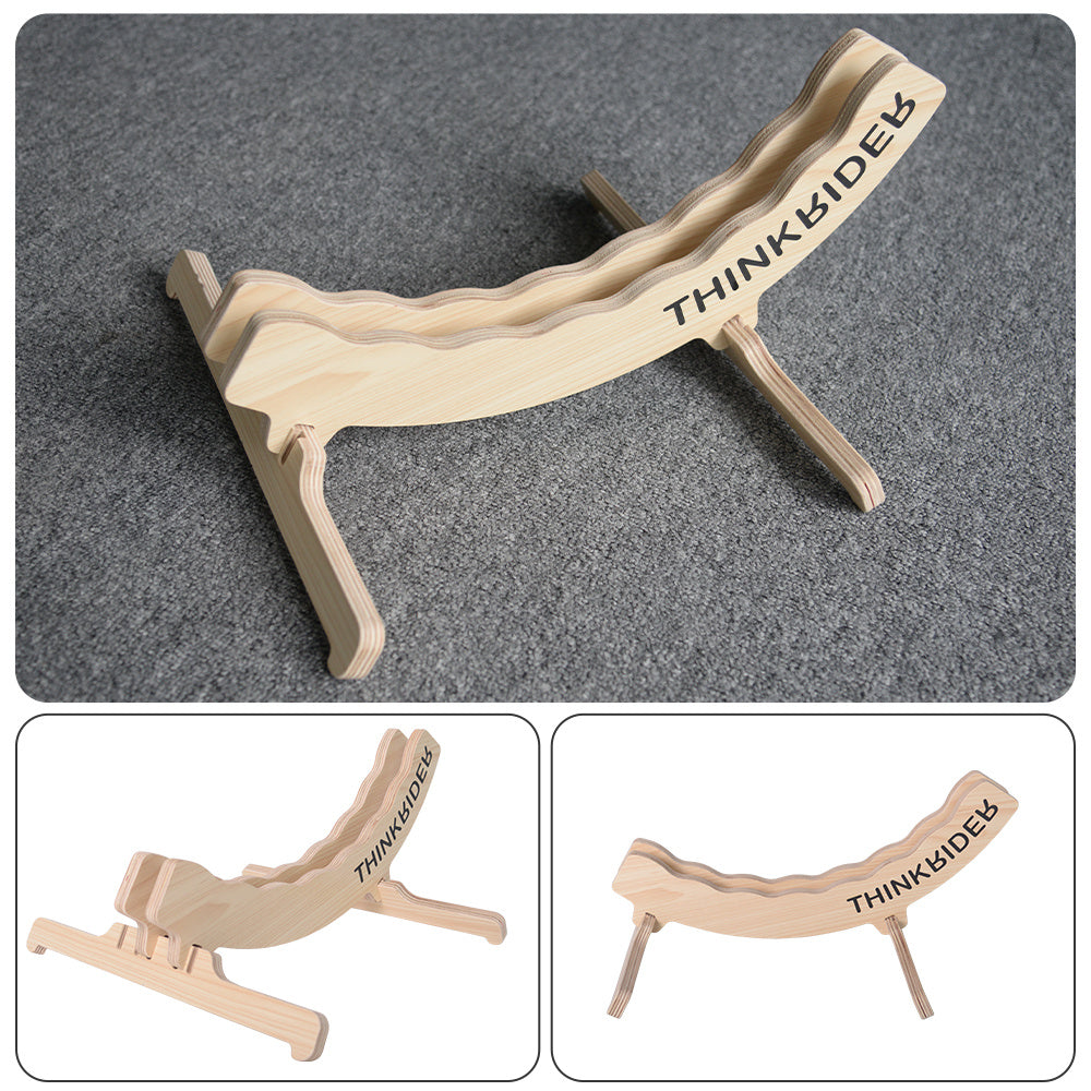 Wooden bicycle stand with 'THINKRIDER' branding on a gray background