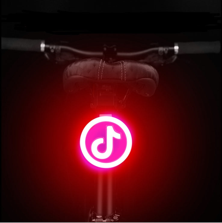 Rechargeable USB Bicycle Rear Light featuring a music note symbol.
