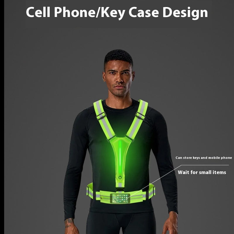 Man wearing a green reflective vest with built-in LED light with text about cell phone/key case design on a gray background