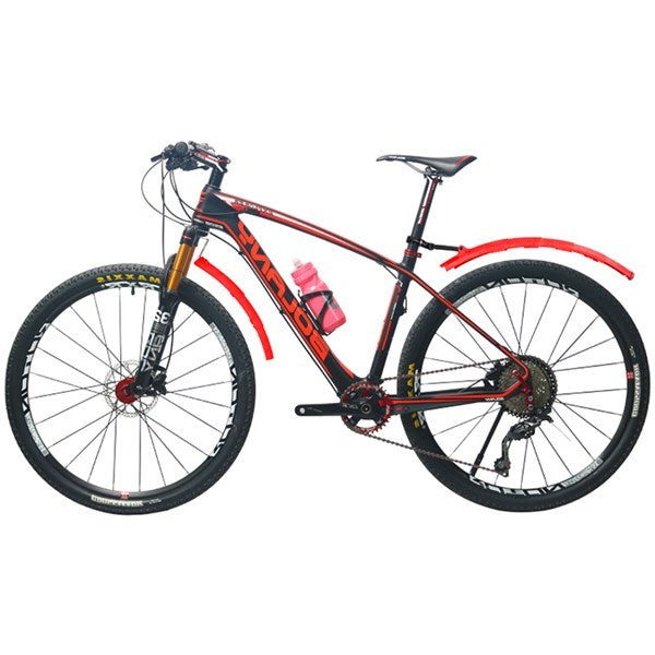 Red and black mountain bike with red retractable mudguards on a white background