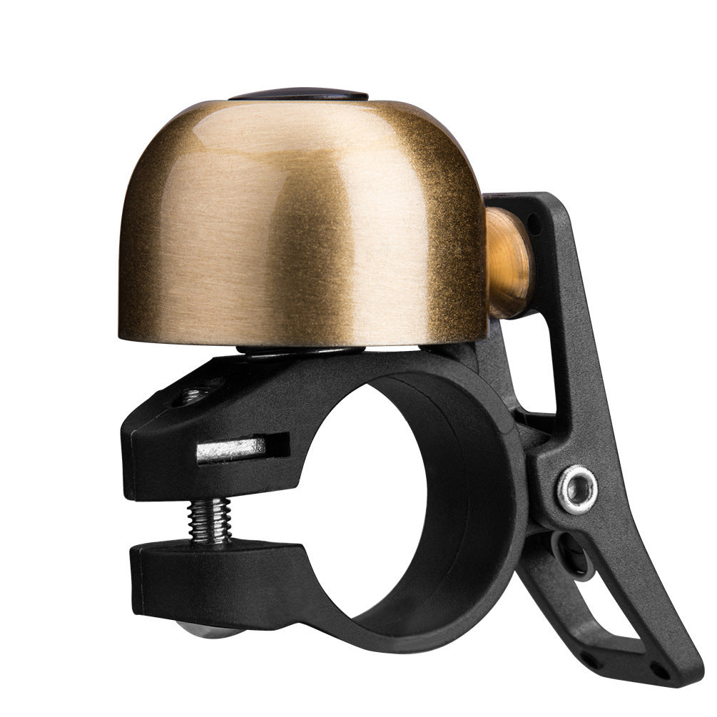 Brass-colored bicycle bell with black mounting bracket on a white background