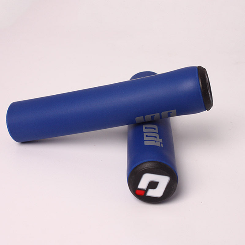 Blue silicone bicycle handlebar grips with a logo on a white background