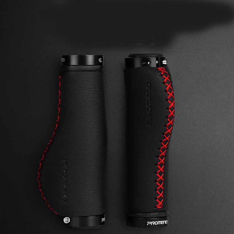 Black Synthetic Leather Bicycle Handlebar Grips with red stitching on a dark background