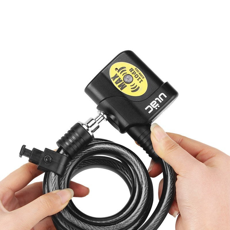 Hand holding a black bike cable lock with alarm, featuring UPEC branding.