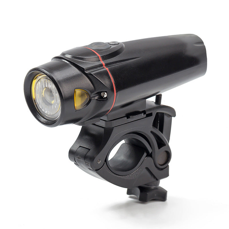 Black bicycle light with mounting bracket on a white background