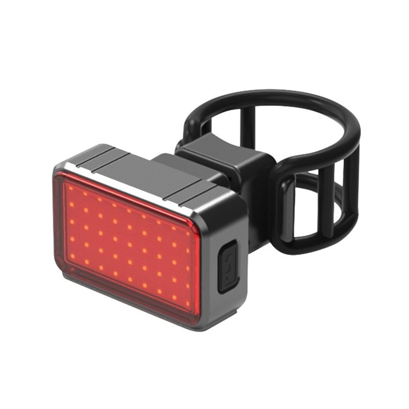 Red LED bike light with black attachment band on a white background