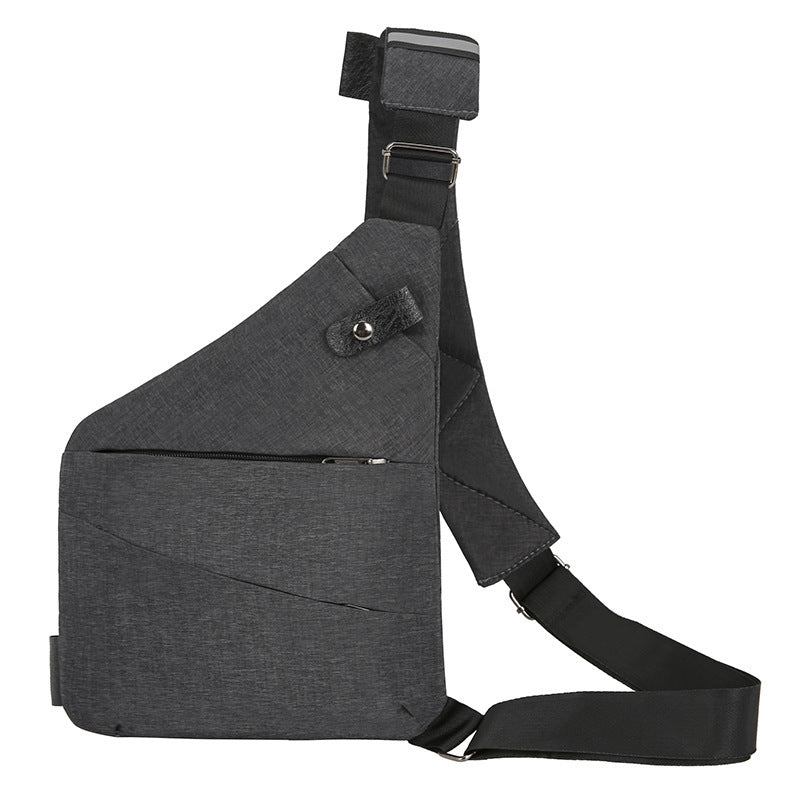 Gray shoulder bag with a black strap on a white background