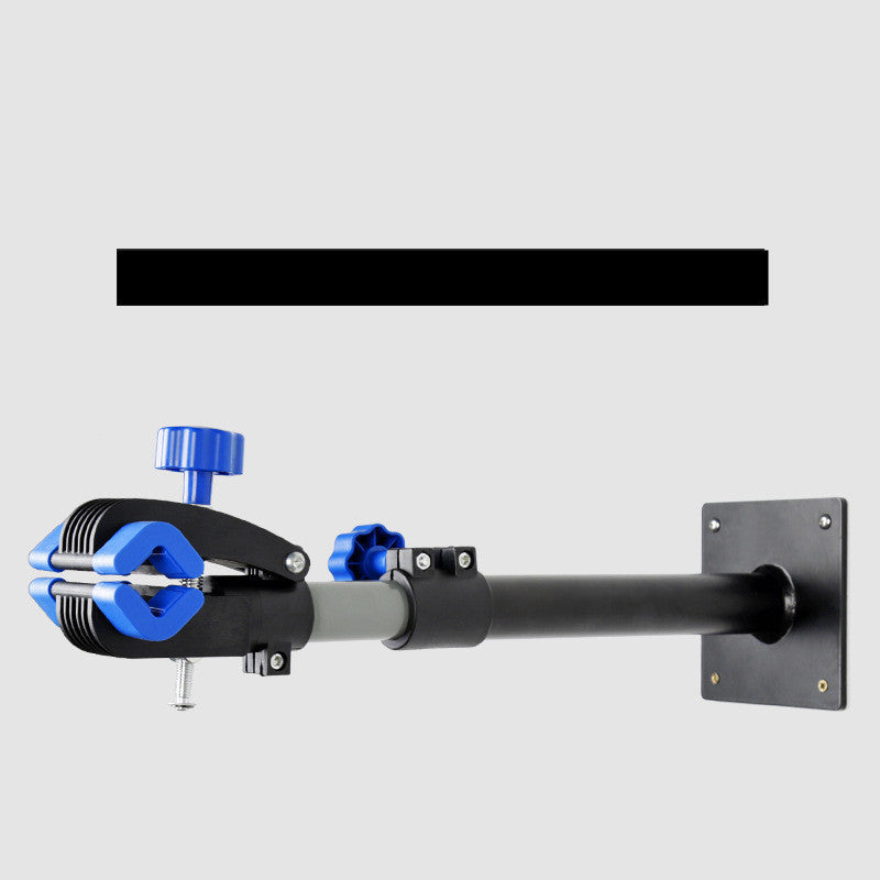 Wall-mounted Bicycle Maintenance Support with blue clamps on a light gray background
