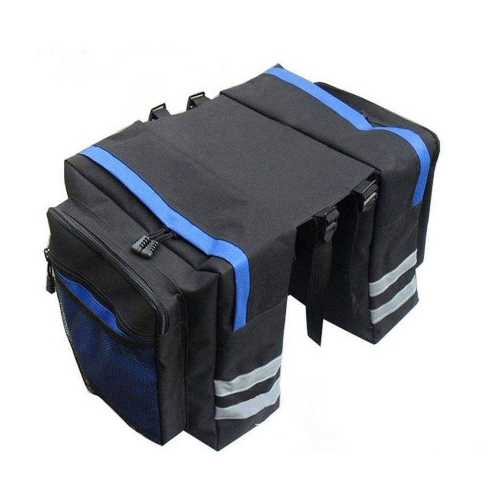 Black and blue bicycle panniers with reflective stripes on a white background